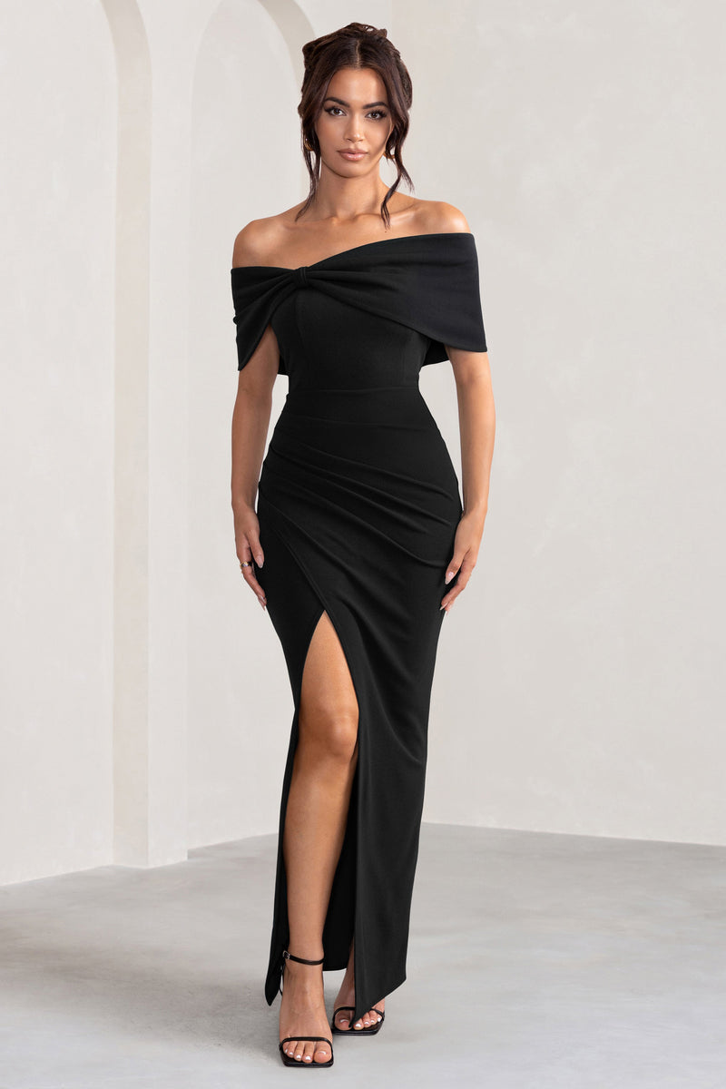 Eva | Vestido largo negro con escote Bardot, detalle de lazo y abertura en el muslo