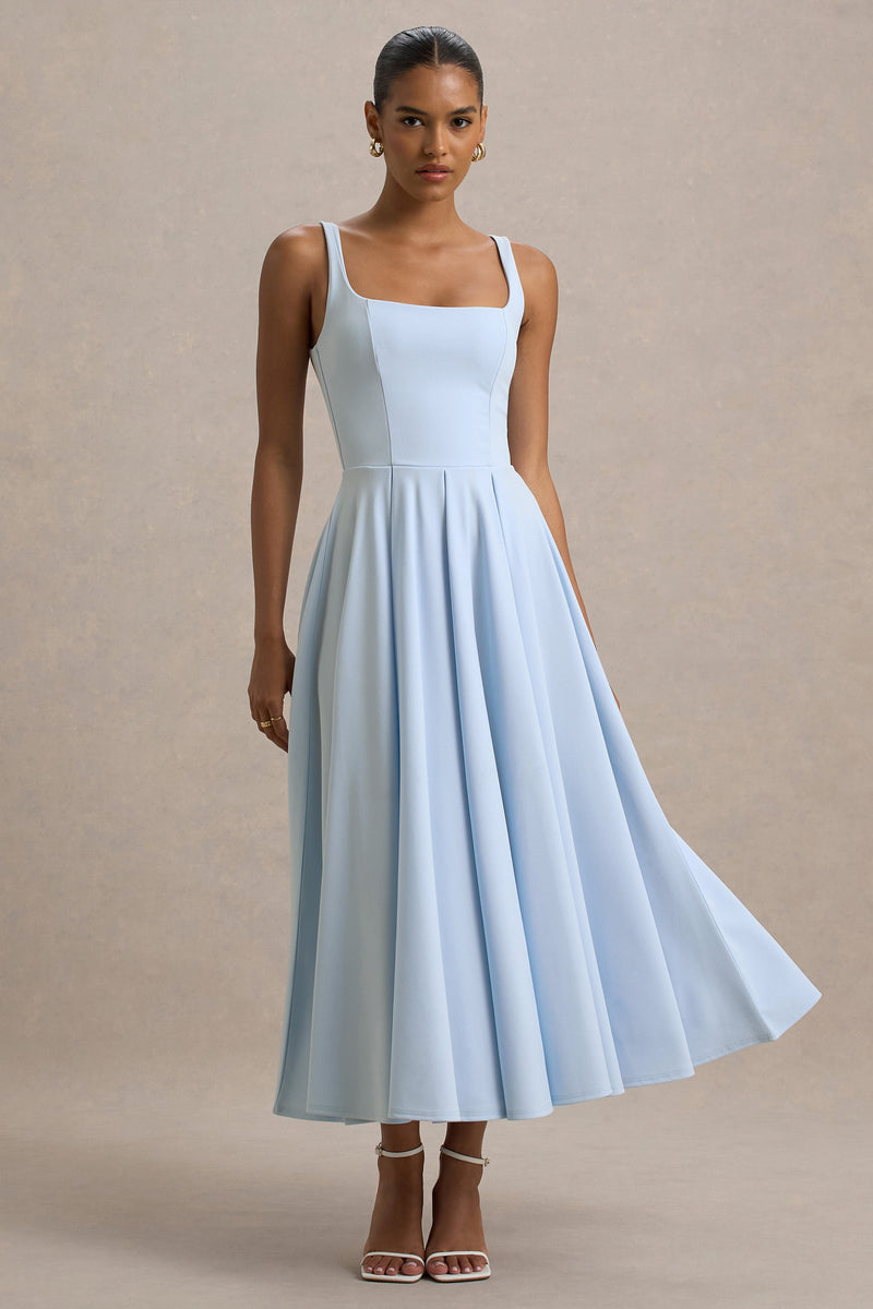 Parina | Vestido midi azul empolvado de tirantes y con bajo voluminoso