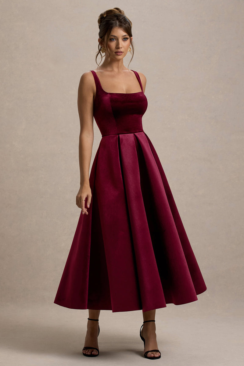 Francisca | Vestido midi de terciopelo color baya, con tirantes y bajo voluminoso