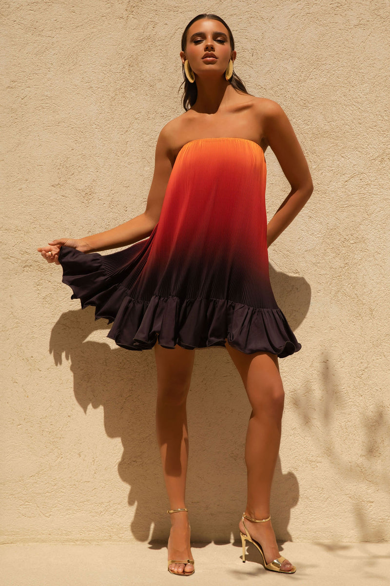 Tropical | Vestido mini de satén naranja degradado con bajo de volantes