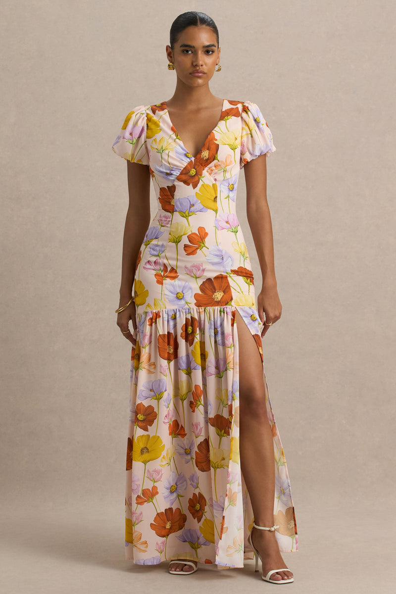 Ginny | Vestido largo con abertura, mangas abullonadas y estampado floral vibrante