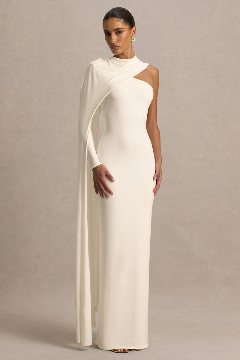 Dawn | Vestido maxi color crema de cuello alto con una manga larga tipo capa