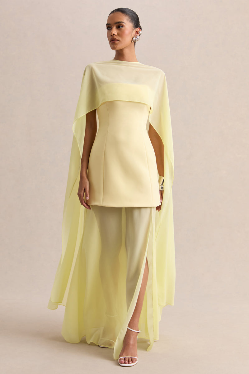 Chessa | Vestido largo color limón con escote barco y capa transparente