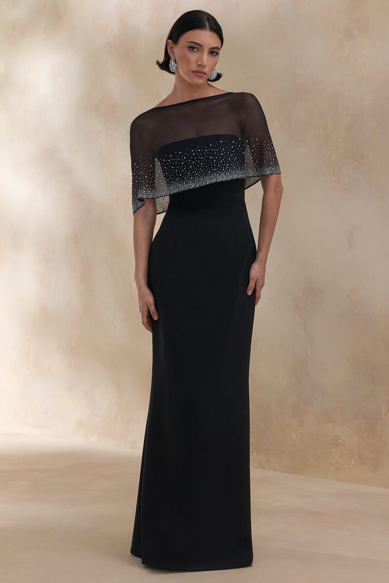 Everly | Vestido maxi negro con mangas tipo capa y detalles hechos a mano