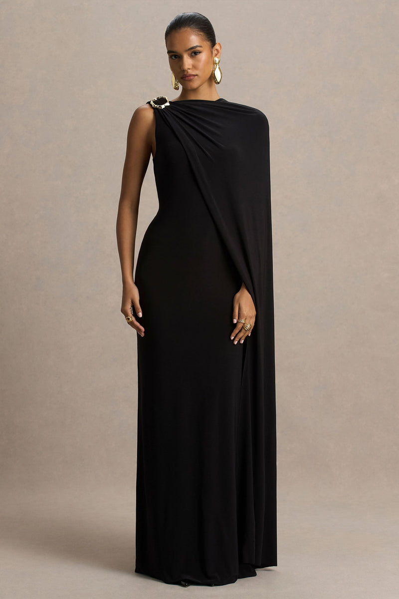 Cressida | Vestido maxi negro de cuello asimétrico con capa y detalle dorado