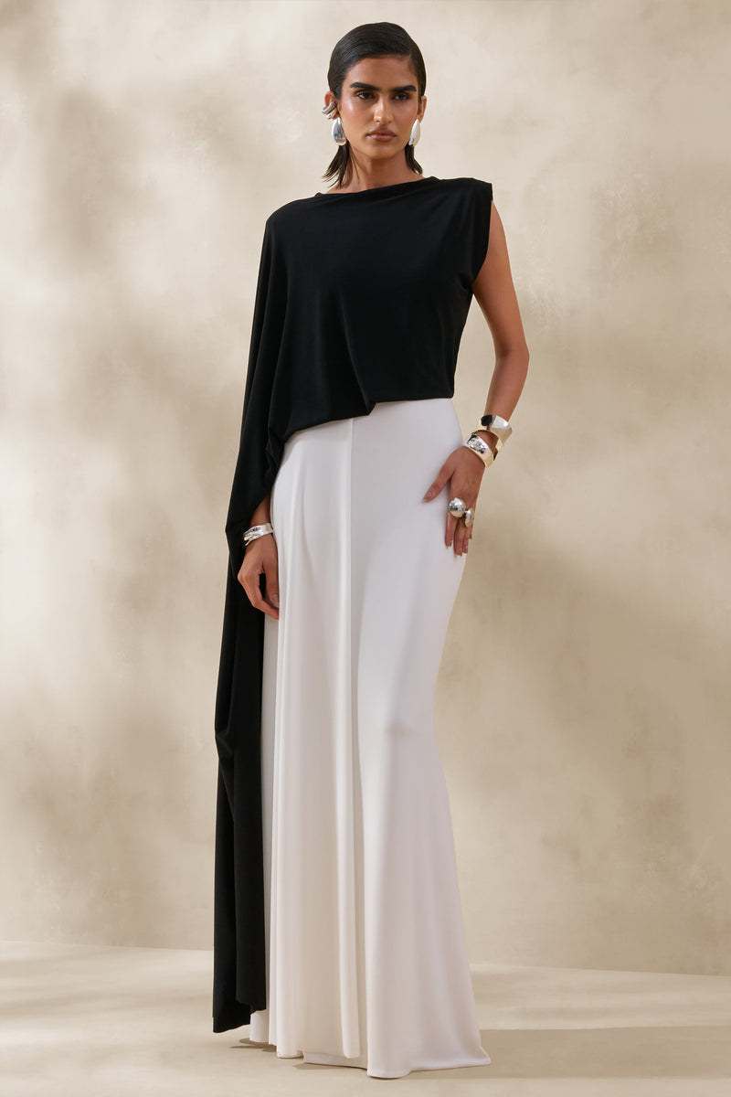 Carenza | Vestido maxi blanco y negro con escote amplio y mangas tipo capa
