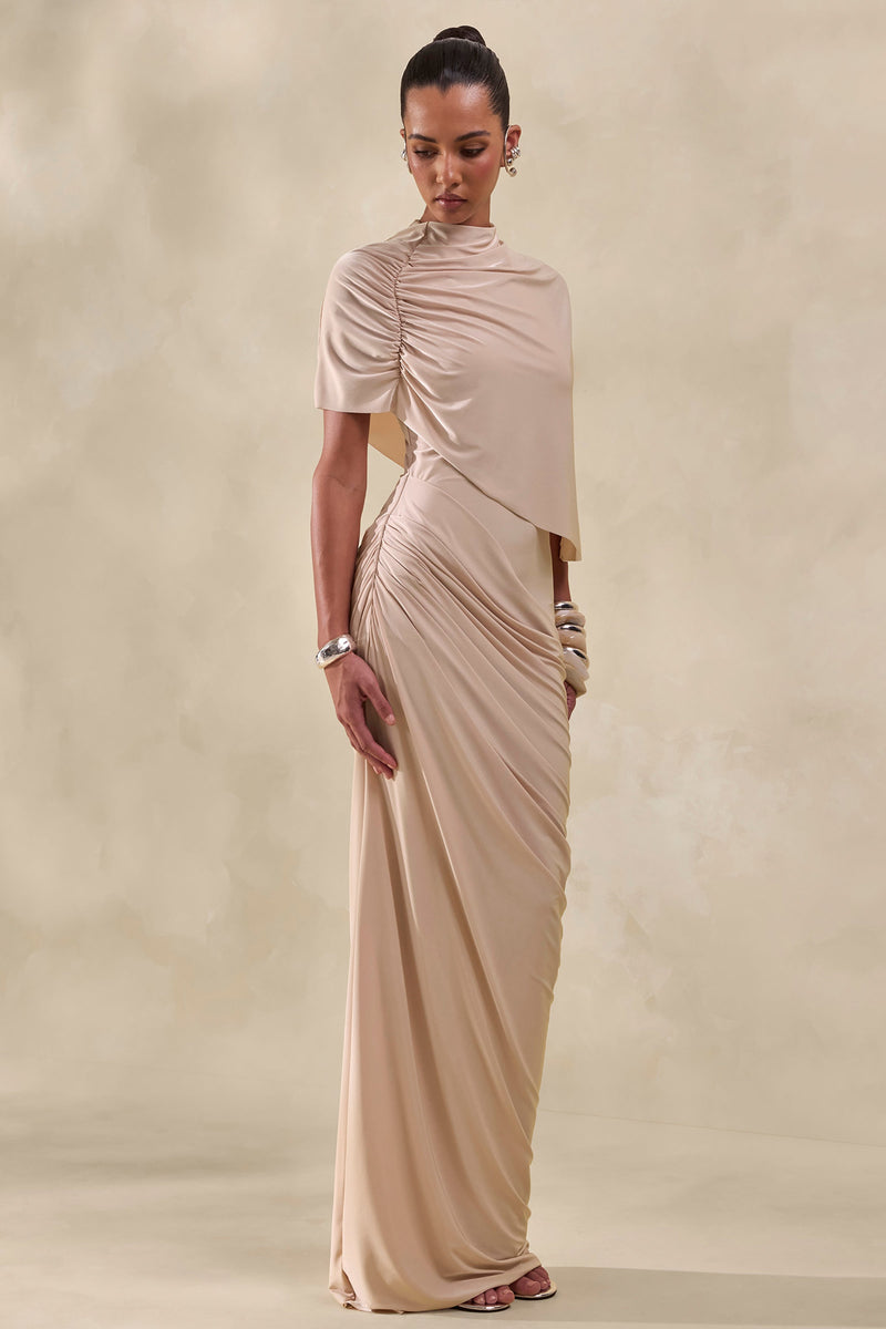 Lunaline | Vestido maxi color champán de cuello alto con capa asimétrica y detalles drapeados