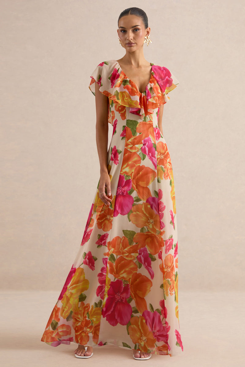 Naelle | Vestido largo de gasa naranja con estampado floral, escote profundo y detalles de volantes